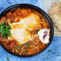 Shakshuka Platter · 2 organic poached eggs on top of spicy tomato and pepper stew. Spicy.