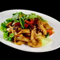 Drunken Noodle** · Stir fried wide rice noodle with bell pepper, onions, tomato and basil in our special Thai c...