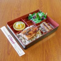 9. Bento Box · Comes with 2 pieces of egg roll, green salad, rice, miso soup, and fruit.