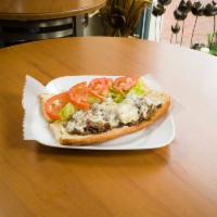 Steak Sandwich · Steak Philly, lettuce, tomato, onion, and mayo on a sub roll.