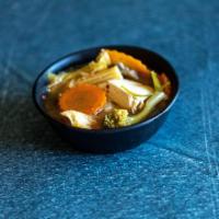 11. Tom Yum Vegetarian Tofu Soup · Served with hot and spicy soup, mushroom, onion, tomato, lemon grass, galanka root, lime jui...