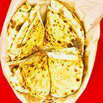Keema Naan · Bread stuffed with minced marinated lamb mixed with spinach and spices.