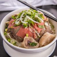 Combination Noodle Soup · noodle soup with combination of beef. Eye round, brisket, flank, meatballs, and tendons.