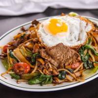 Drunken Noodle · Stir fried fresh noodle with beef, bok choy, cherry tomatoes, basil,and bean sprouts. Topped...