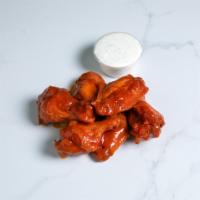 Wingin Clucker • 6pc · Six jumbo wings tossed in our signature buffalo sauce with ranch on the side

• served with ...