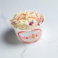 Coleslaw · Shredded cabbage and carrots with classic sauce