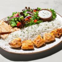 Chicken Kabob Plate · Succulent pieces of boneless chicken tenders. Plates include: Basmati rice, pita bread, tzat...
