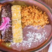 Enchiladas Milagro( Serve with Rice and Beans  · Red,Green and Mole Enchiladas with rice and beans.