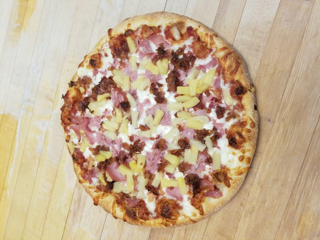 Hawaiian Pizza · Cheese, bacon, pineapple and ham.