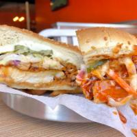 Fried Chicken Sandwich · Spicy Chicken Sandwich with coleslaw, sweet pickles, mozzarella cheese and our house sauce. ...