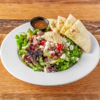 Greek Salad · Mesclun greens, roasted red peppers, chopped artichokes, marinated olives, feta cheese in ba...