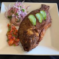 Pescado Frito · Whole fried fish served with 2 sides orders.

