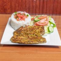 Churrasco de Pollo Special · Tender breast marinated in cilantro, peppers, garlic, and onions served with 2 sides.
