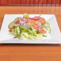 House Salad · Lettuce, tomatoes, onions, cucumbers.
