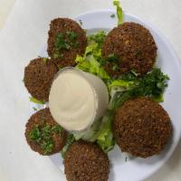 6 Piece Falafel · Mixture of garbanzo and fava beans with fresh onions, garlic, parsley and special spices.