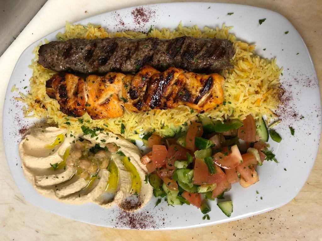 Combo Kabob Plate · Grilled chicken and kafta kabab, Mediterranean seasoning, served with rice, salad and hummus.