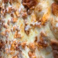 Buffalo Chicken Pizza · Grilled chicken with our famous Buffalo sauce, mozzarella and bleu cheese dressing drizzled ...
