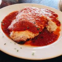 Veal Parmigiana · Served with choice of side.