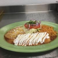 Enchiladas de Queso · Corn tortillas stuffed with Mexican cheese, choice of red or green sauce. Served with rice a...