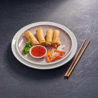 Vegetarian Crispy Roll · Crispy rolls stuffed with soft tofu, taro, cabbage, glass noodle and served with homemade ve...