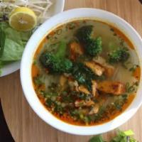 Tofu Noodle Soup (hủ tiếu chay) · Tofu, Rice noodle, lettuce, Thai basil, bean sprout, green onion, broccoli and vegetable bro...