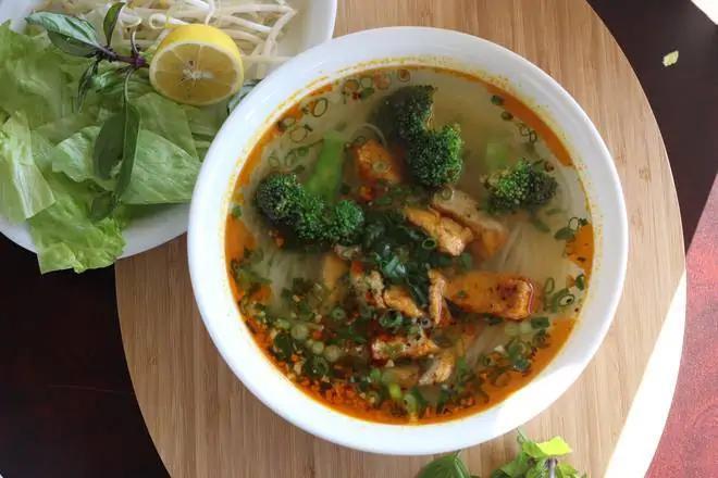 Tofu Noodle Soup (hủ tiếu chay) · Tofu, Rice noodle, lettuce, Thai basil, bean sprout, green onion, broccoli and vegetable broth.