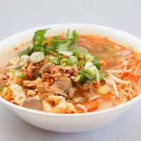 Combo Noodle Soup(hủ tiếu đặc biệt) · Shrimp, chicken, pork, rice noodle, bean sprout, lettuce, Thai basil, roasted peanut and gre...