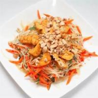 Tofu Papaya Salad (gỏi đu đủ chay) · Lemongrass tofu, green papaya, carrots & daikon pickle, Thai basil, roasted peanut and homem...