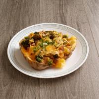 Todd's Favorite · A baked SpudToddo with ham, broccoli, cheddar cheese, Todd's mustard sauce and green onions.