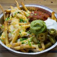 Vegas Garbage Fries · SpudToddo fries smothered in nacho cheese and topped with pepper jack cheese, jalapenos, gre...