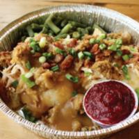 Turkey on Mashed · Mashed SpudToddos, topped with pulled turkey, cornbread stuffing, gravy, bacon, green onions...