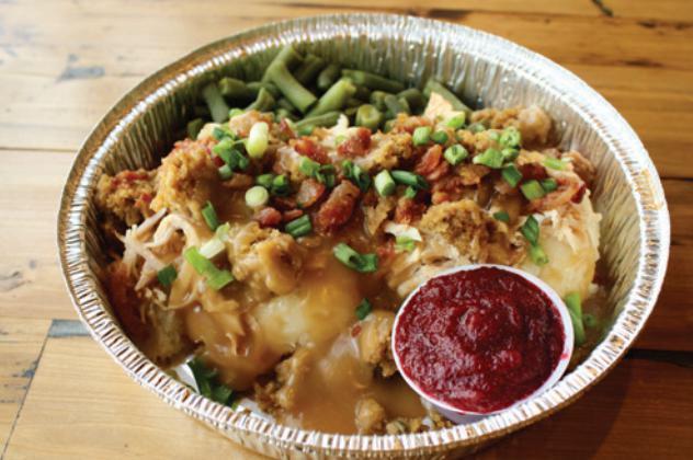 Turkey on Mashed · Mashed SpudToddos, topped with pulled turkey, cornbread stuffing, gravy, bacon, green onions, green beans on the side and a side of cranberry citrus sauce.