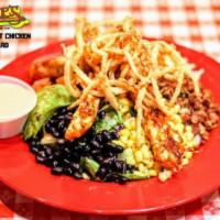 Southwest Chicken Salad · BBQ grilled chicken, bacon, cheese, corn, black beans, tomato, avocado slices with crispy fr...
