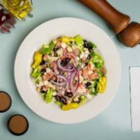 Mediterranean Greek Salad · Mixed greens, cucumbers, Kalamata olives, tomatoes, pepperoncini, feta cheese and red onions...