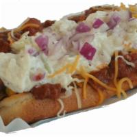 Atlanta Slaw Dog · Steve's chili con carne, cheddar jack cheese, topped with cole slaw and diced red onions.