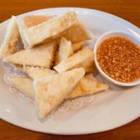 A8. Crispy Fried Tofu · Served with sweet chili sauce and crushed roasted peanuts.