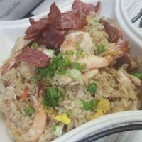 CS1. Special Fried Rice · Stir-fried rice with eggs, shrimp, chicken, Thai sweet sausage, bacon, scallion, and tomatoes.