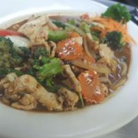 P7. Spicy House Special · Stir-fried fresh bell peppers, onions, carrots, cabbage, broccoli, mushrooms, and basil in T...