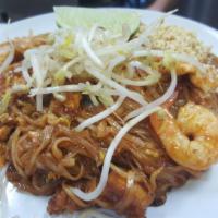 N1. Pad Thai · Rice noodles stir-fried with your choice of meat, eggs, crushed peanuts, bean sprouts, tofu,...