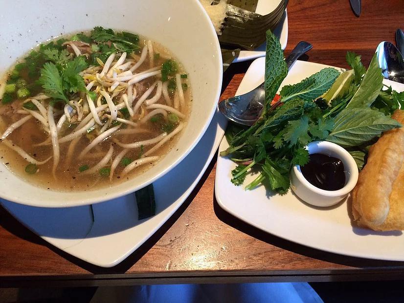 Beef Vietnamese Noodle Soup · Hanoi-style spiced broth, sliced tenderloin, thin rice noodles and fresh herbs.