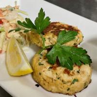 Crab Cakes App · two lump crab and butter cracker cakes, with apple
slaw and housemade remoulade on the side