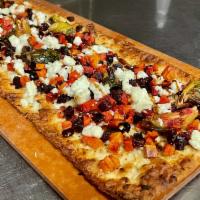Roasted Vegetable Flatbread · roasted beets, sweet potato, carrots, brussels
sprouts, feta cheese, and balsamic glaze on c...