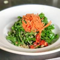 Kale Quinoa Salad · baby kale, quinoa, red pepper, dried cranberries and apricots, carrots, pine nuts, and lemon...