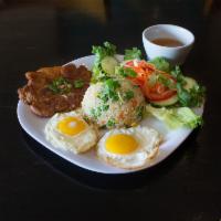 33. Grilled Pork Chop and Fried Egg · 