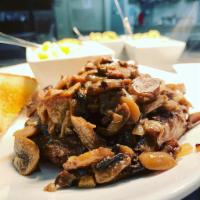 Hamburger Steak · 12 oz. of ground ribeye topped with beer mushrooms and onions. Served with your choice of si...