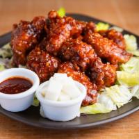 Sweet and Spicy Chicken Wings · Crispy fried chicken wings tossed in our special 5 spice sauce, blazing with flavor and crun...