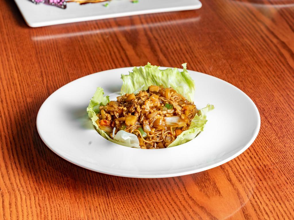 11. Lettuce Wrap  · Choice of shrimp, chicken, or tofu. Fresh water chestnuts and lettuce for wrapping, served with spicy sweet and sour sauce.