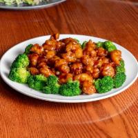 33. General Tso's Chicken  · Tender pieces of chicken lightly battered in lotus flour sauteed with broccoli, dried pepper...