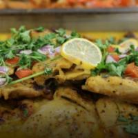 Coconut Lemon Herb Chicken · Roasted with Lemon Herb Ginger and Sambal Base Creamy Coconut Sauce
