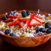 Acai Bowl · Acai, banana, strawberry, berries, soy milk, granola, and honey.